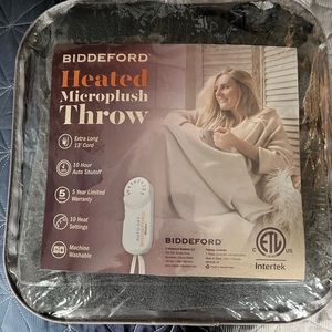 Brand new heated throw